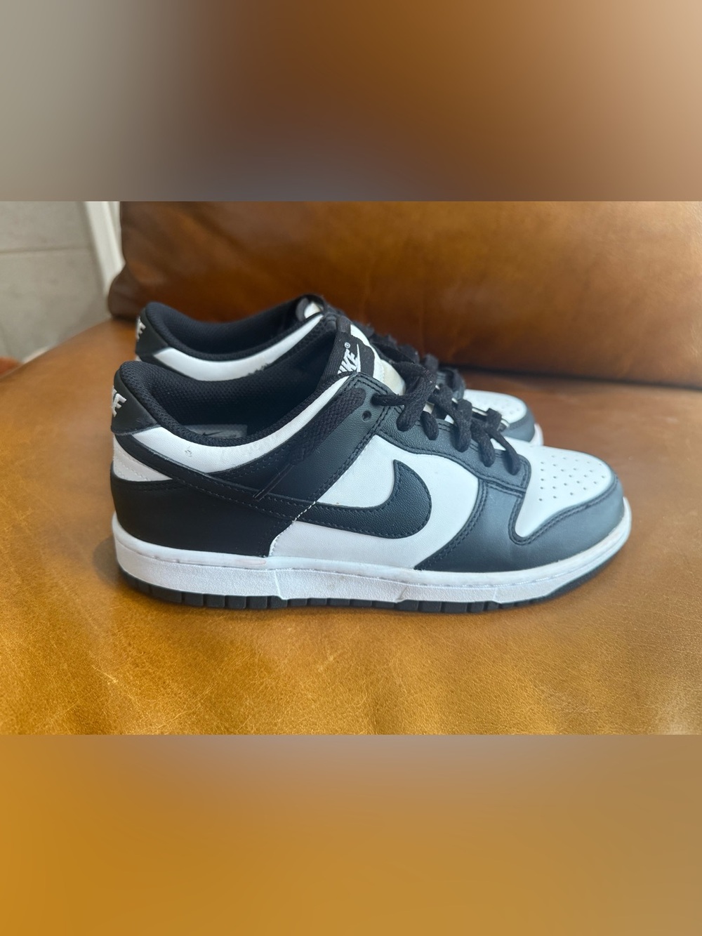 Nike Low Dunk Panda sneakers.